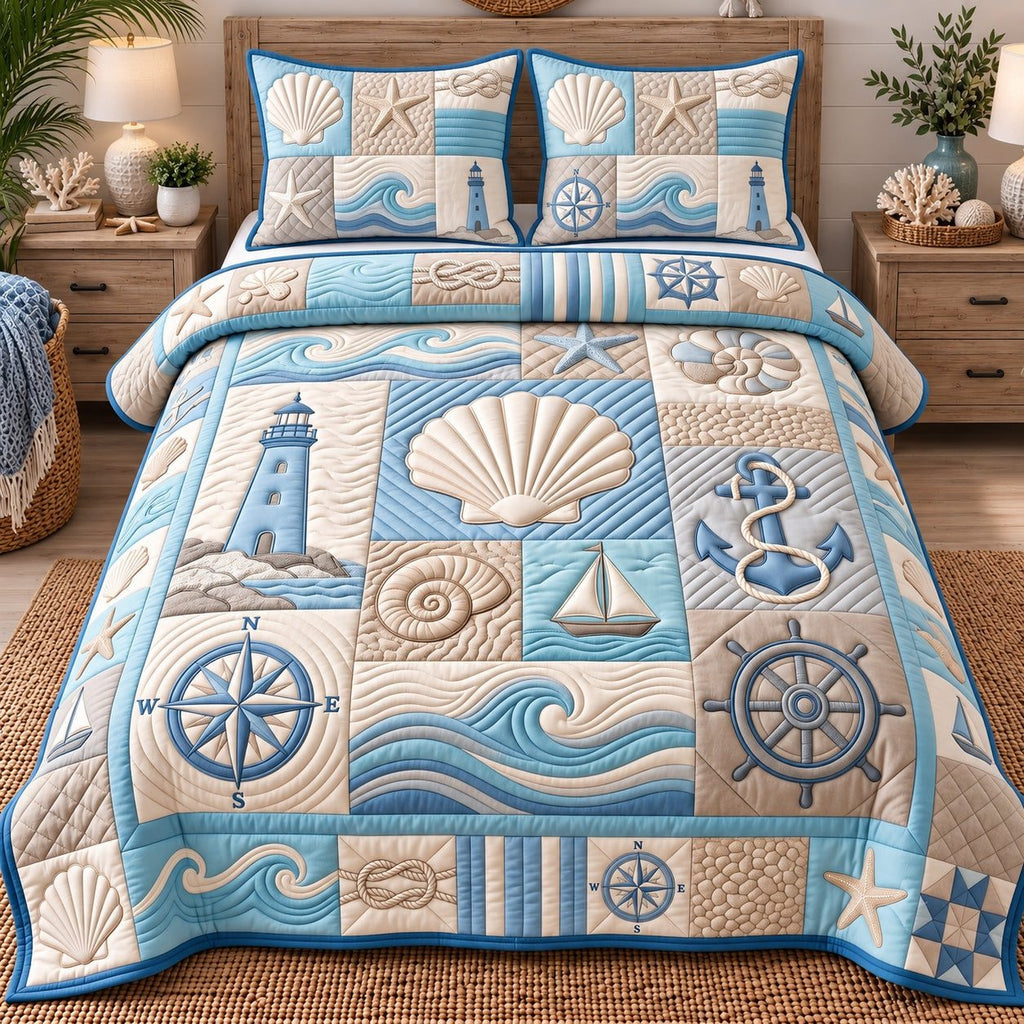 Soft Blue Seashell Coastal Patchwork quilted 3-piece bedding set on a made bed in a light coastal bedroom
