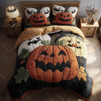 Spooky Pumpkin Faces quilted 3-piece bedding set on a made bed against a dark styled interior
