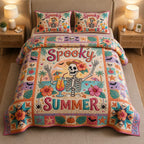 Spooky Summer Pink quilted 3-piece bedding set on a made bed against a dark styled interior