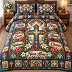 Stained Glass Cross Never Alone quilted 3-piece bedding set on a made bed in a softly lit bedroom