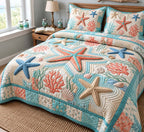 Starfish Coral Coast quilted 3-piece bedding set on a made bed in a light coastal bedroom