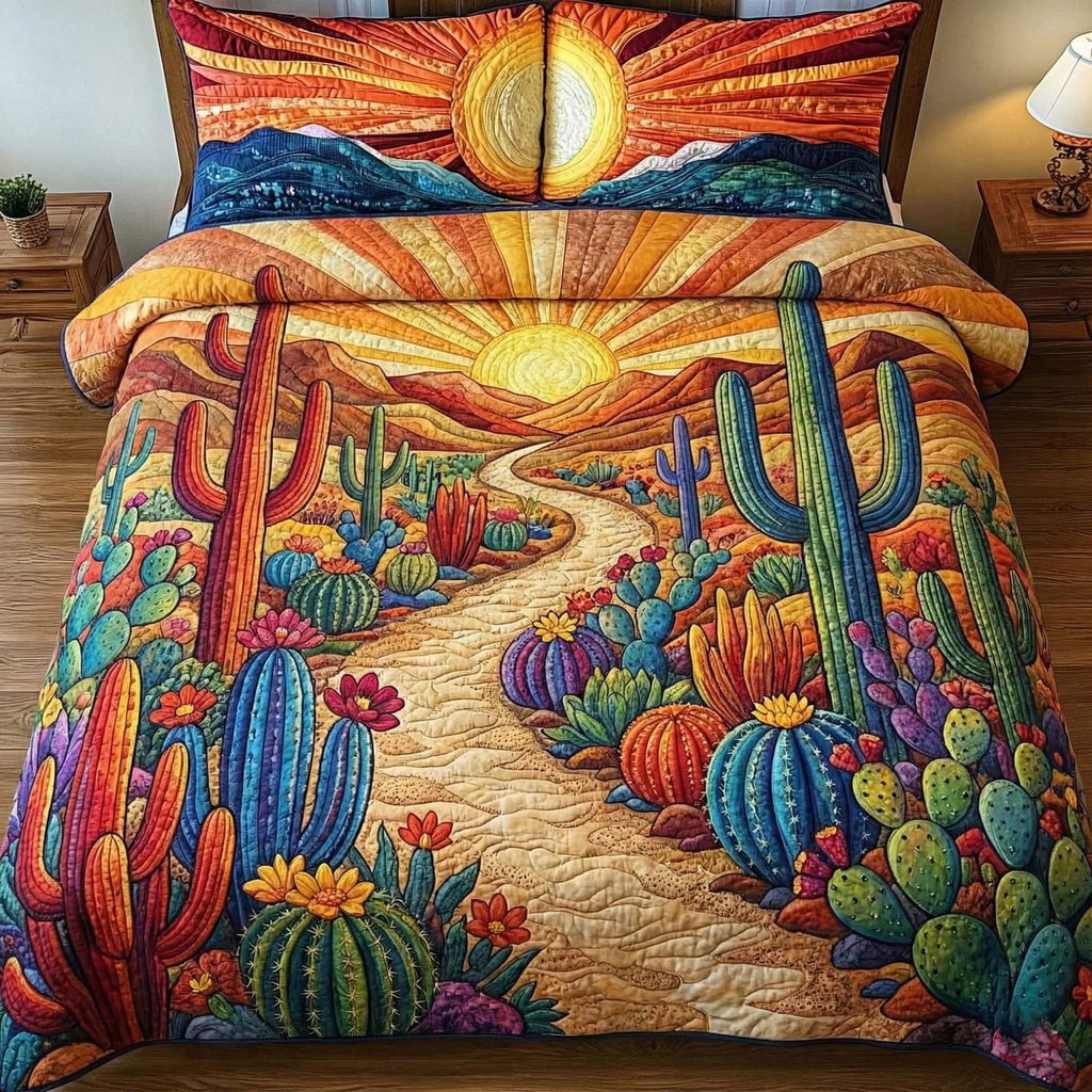 Sunburst Cactus Sunset quilted 3-piece bedding set on a made bed with two matching pillow shams
