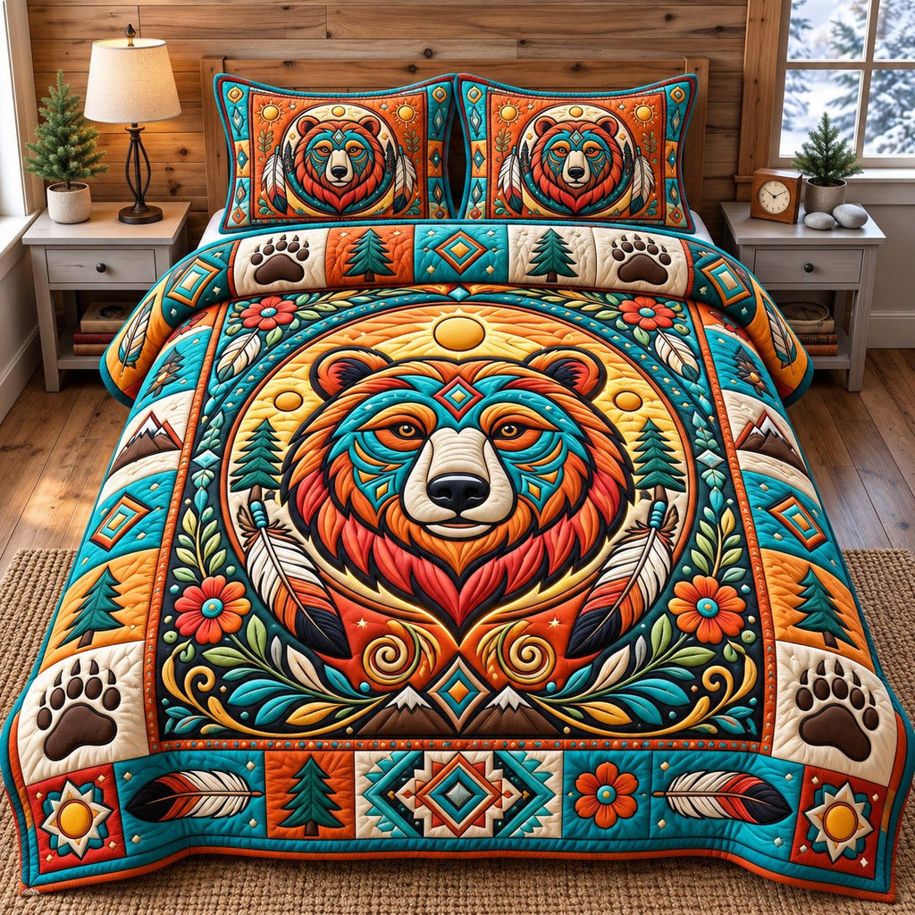Sunburst Native Bear quilted 3-piece bedding set on a made bed with two matching pillow shams