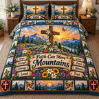 Sunrise Cross Faith Moves Mountains quilted 3-piece bedding set on a made bed in a softly lit bedroom