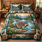 Sunrise River Raccoon quilted 3-piece bedding set on a made bed with two matching pillow shams