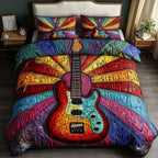 Sunshine Guitar Blue quilted 3-piece bedding set on a made bed with two matching pillow shams