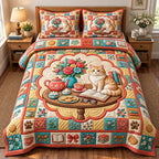 Teatime Ginger Cat Table quilted 3-piece bedding set on a made bed with two matching pillow shams