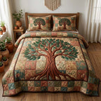 Tree Of Life Patch Cream quilted 3-piece bedding set on a made bed with two matching pillow shams