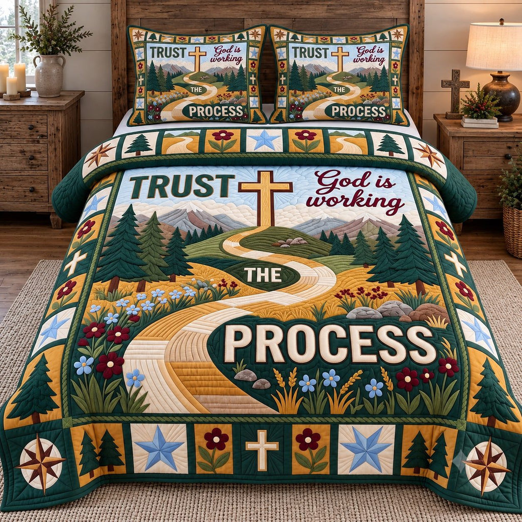 Trust The Process quilted 3-piece bedding set on a made bed with two matching pillow shams