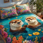 Valentine Couple Otters quilted 3-piece bedding set on a made bed with two matching pillow shams