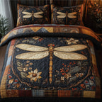 Vintage Dragonfly Navy quilted 3-piece bedding set on a made bed in a warmly lit bedroom
