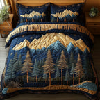 Vintage Woodland Navy quilted 3-piece bedding set on a made bed in a warmly lit bedroom