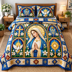 Virgin Mary Mercy quilted 3-piece bedding set on a made bed with two matching pillow shams
