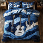 Waves Of Guitar Navy quilted 3-piece bedding set on a made bed in a warmly lit bedroom