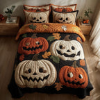Whimsical Pumpkin Faces quilted 3-piece bedding set on a made bed against a dark styled interior