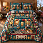 Whiskers Word Bookshop quilted 3-piece bedding set on a made bed with two matching pillow shams