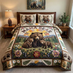 Wildflower Mama Bear Legacy quilted 3-piece bedding set on a made bed with two matching pillow shams