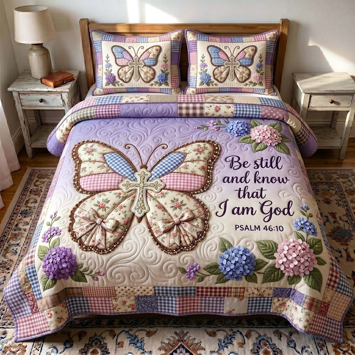 Wings Of Faith Purple quilted 3-piece bedding set on a made bed in a softly lit bedroom