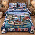 Winter Harbor Boat quilted 3-piece bedding set on a made bed in a winter-styled bedroom